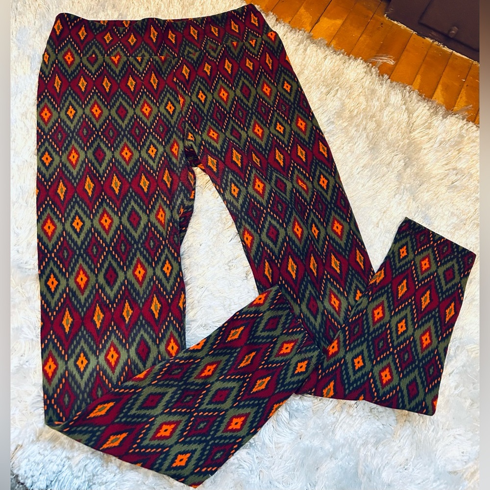 Nice pair of LuLaRoe leggings!  Size One Size. OS. Beautiful, beautiful colors